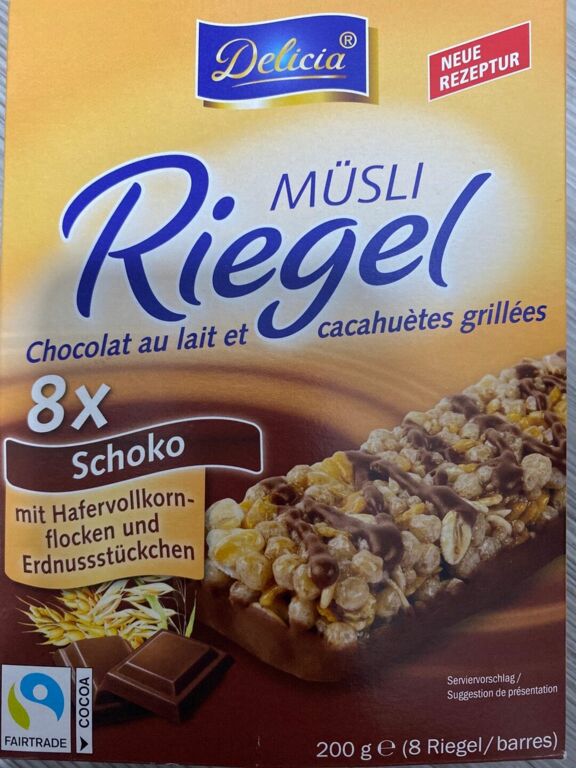 Delicia MÜSLI Riegel chocolat au lait et cacahuètes grillées 8 × Schoko mit Hafevollkornflocken & Erdnussstückchen